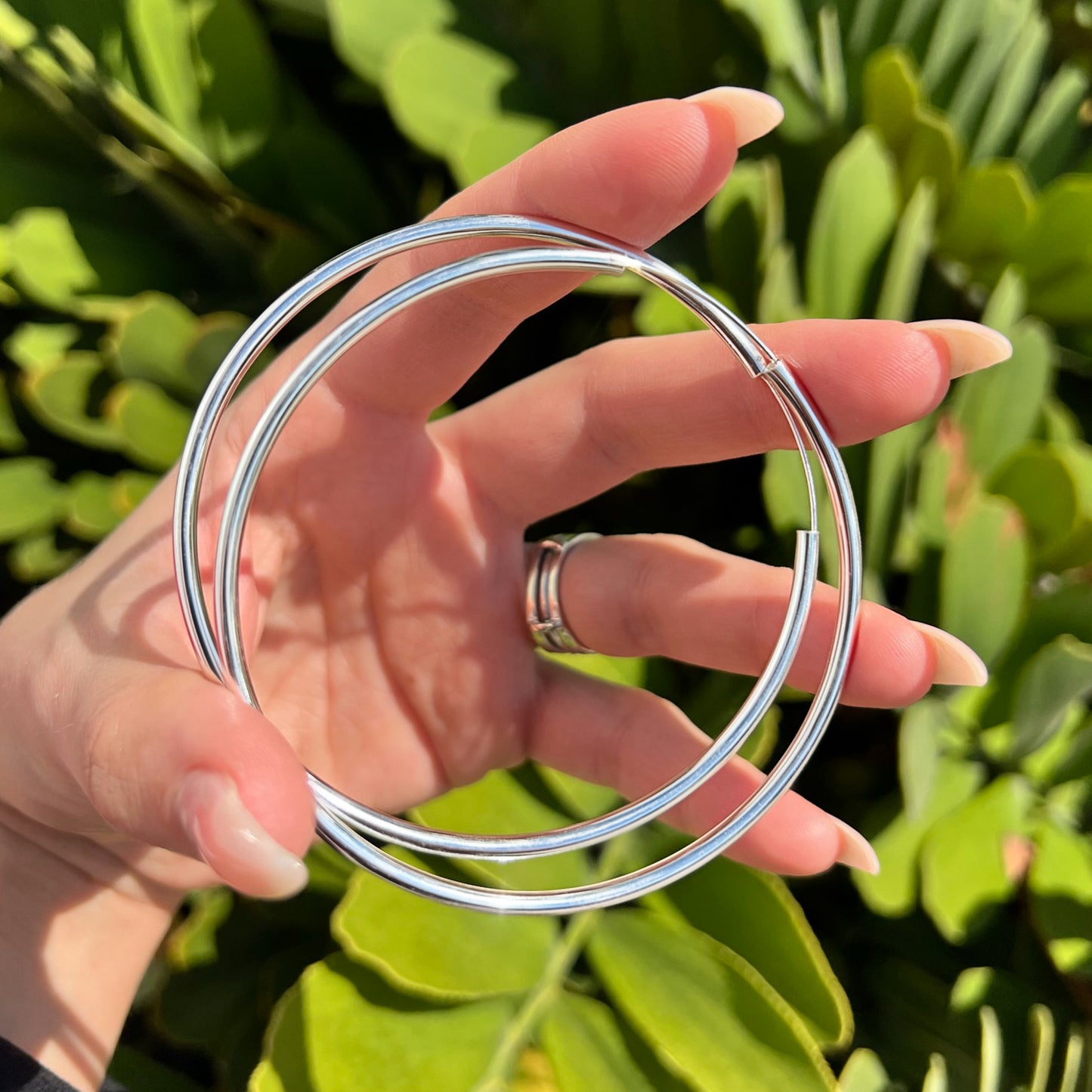 Continuous Hoop Earrings in Sterling Silver