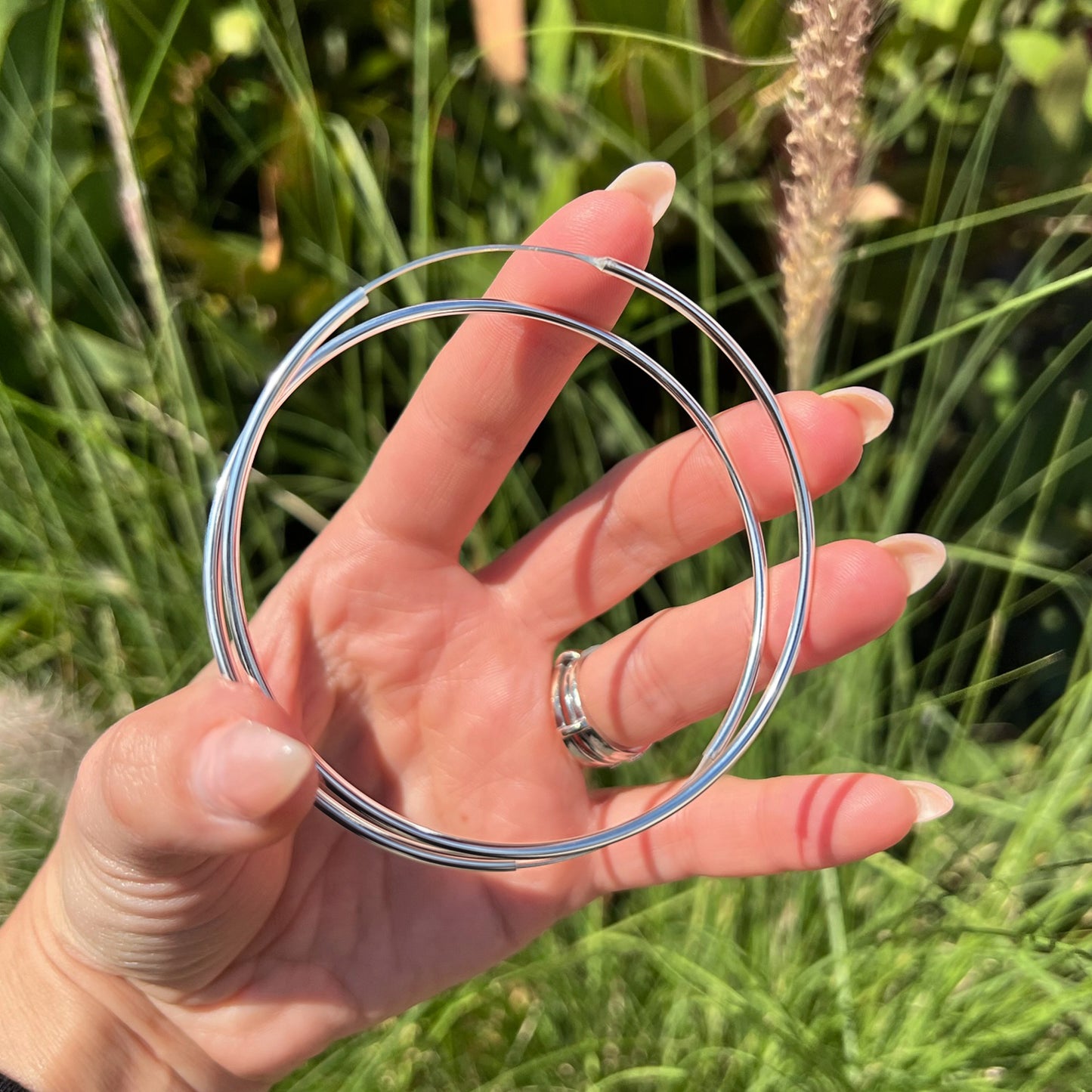 Continuous Hoop Earrings in Sterling Silver