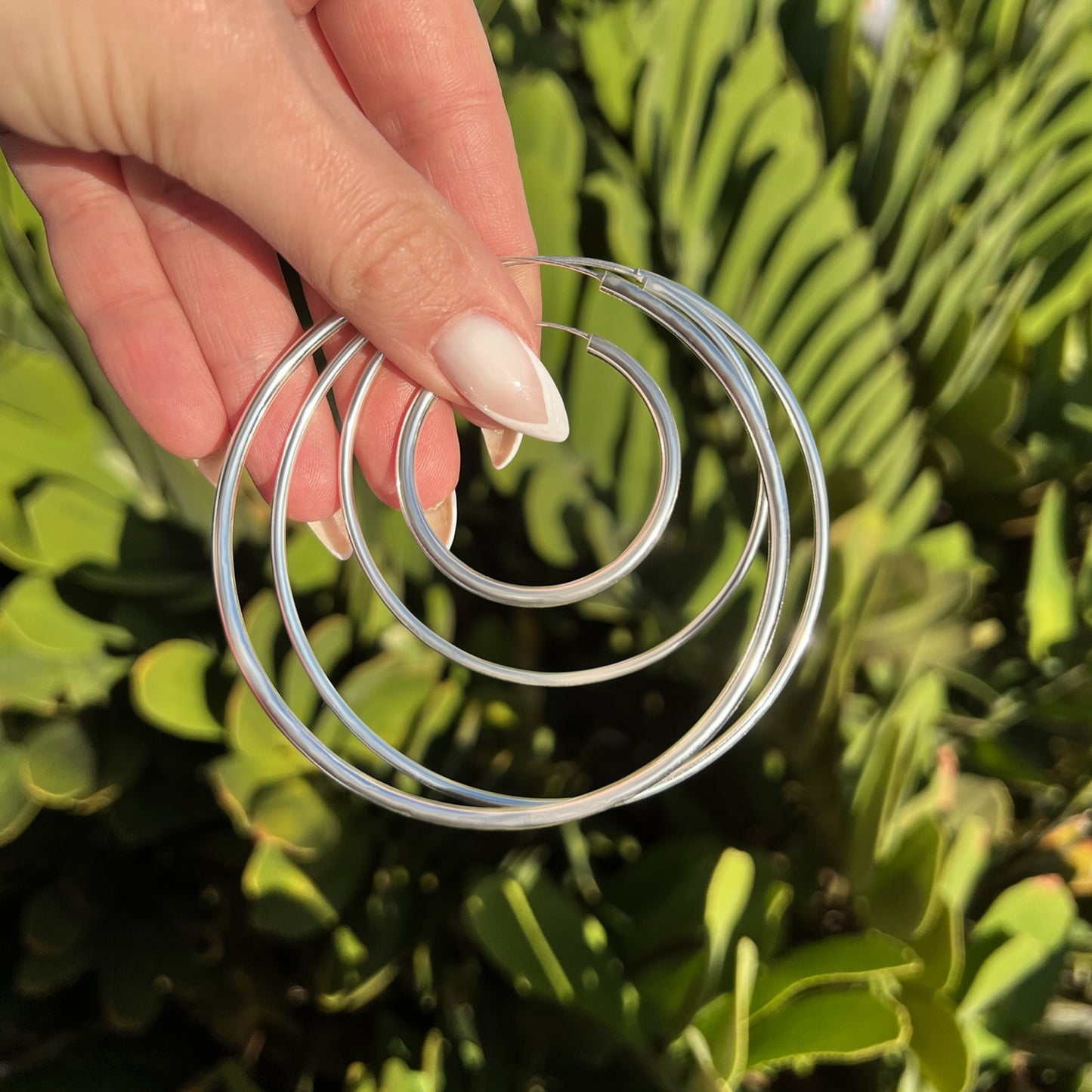 Continuous Hoop Earrings in Sterling Silver