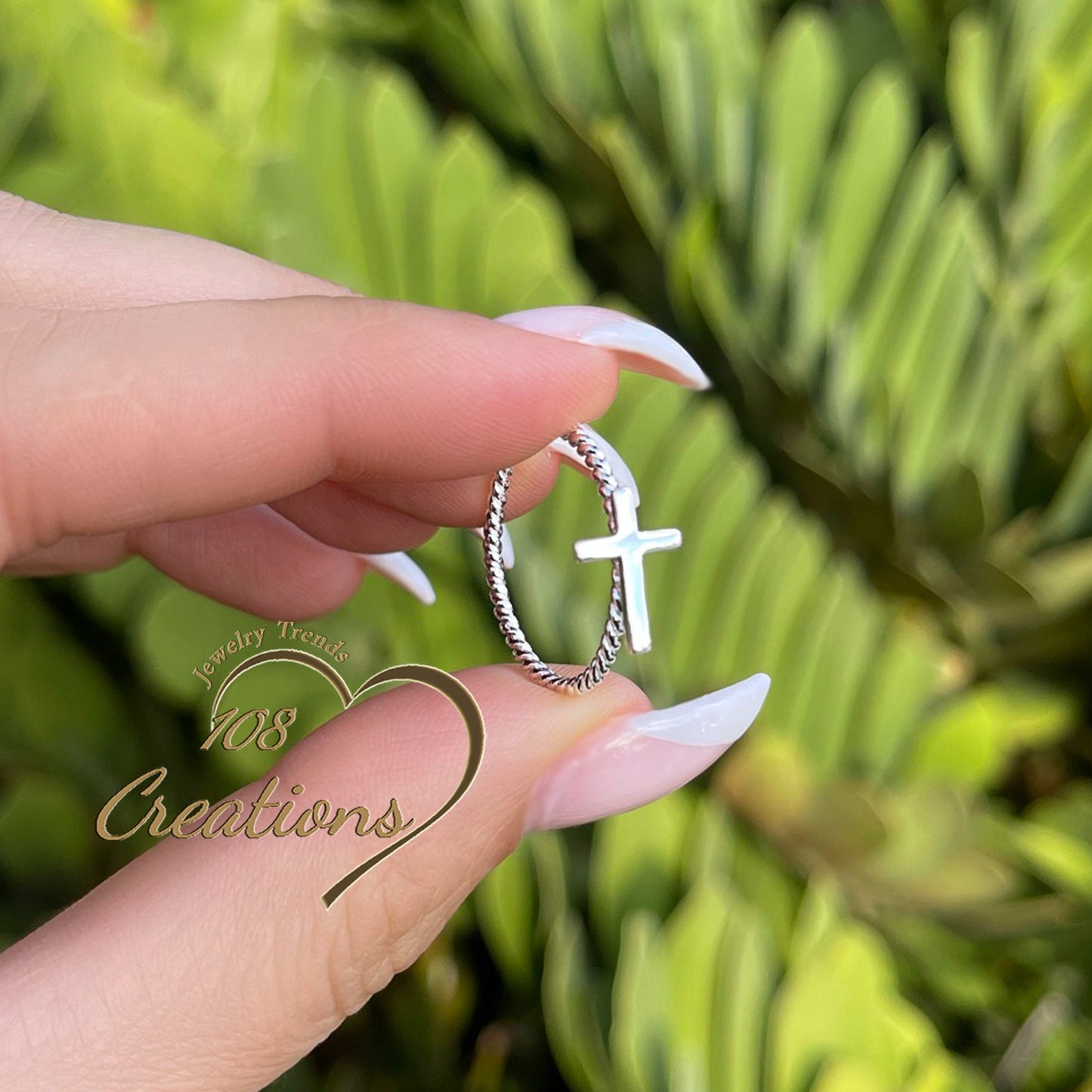 Sideways Cross Ring with Twisted Rope Design